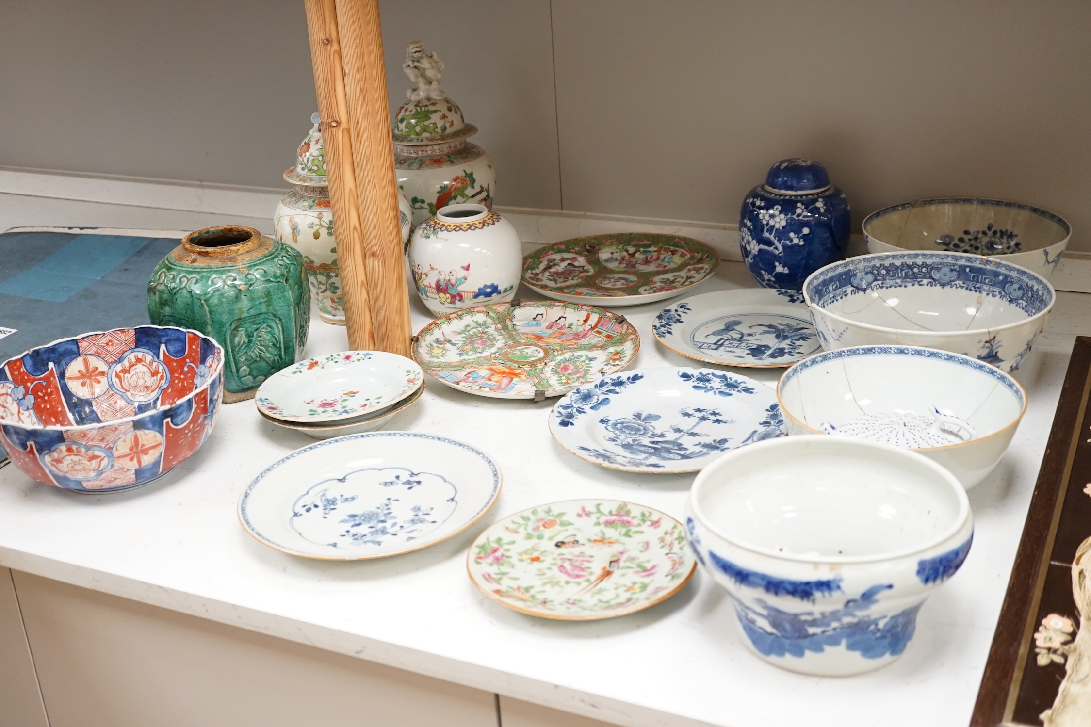 A group of mostly Chinese and Japanese ceramics, 18th century and later together with a Delft plate, tallest 30cm